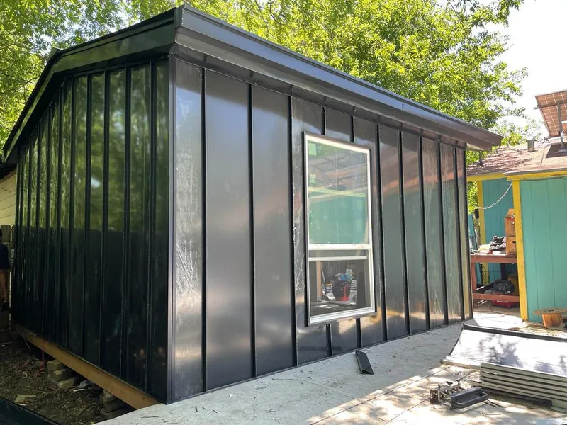 Black standing seam metal wall panels for Metal Roof Installation in Tontitown