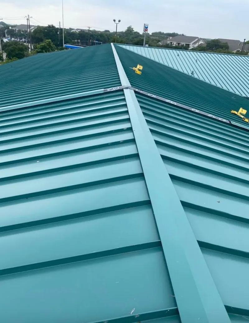 Green commercial metal roof ridge and valley for Metal Roof Repair in Tontitown